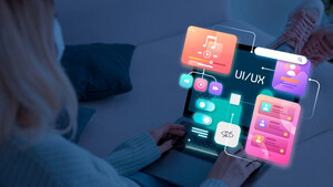 Modern web designer working on sustainable web design trends 2025 with minimalist interface and 3D elements across multiple devices