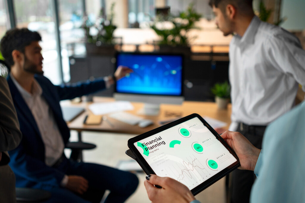 Marketing agencies team reviewing automated client reporting dashboards and reporting tools to streamline client report processes in 2025
